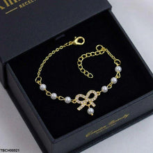 TBCH00521 XST Bow Pearl Chain Bracelet Adjustable - TBCH